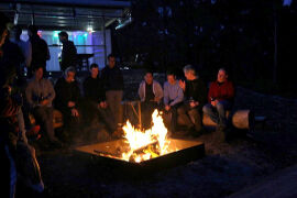 Relaxing by the outside fire at Bruny Island Lodge