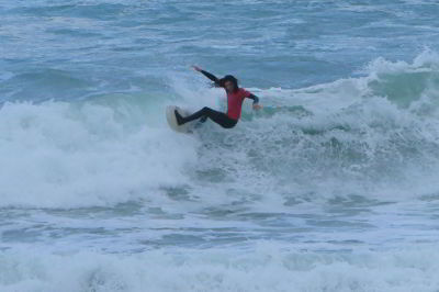 Guy surfing in Bruny Island surfing competition